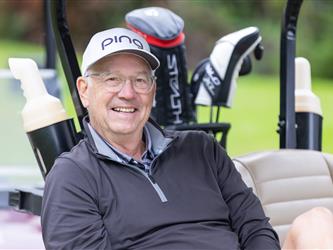 attendee at golf tournament