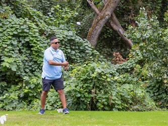 attendees playing golf