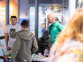 guest speaking with booth 