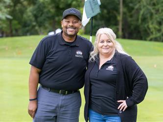 attendees at golf tournament