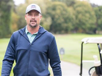attendee at golf tournament