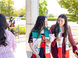 students wearing mexico flag around neck