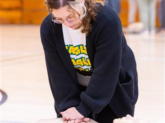 CPR instructor speaking to attendees