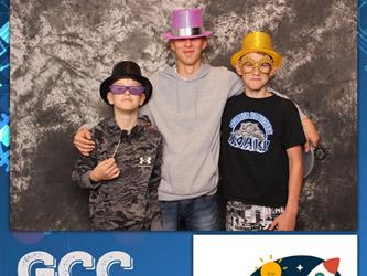 children posing for photo booth 