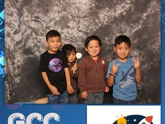children posing for photo booth