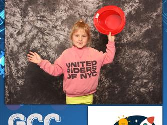 child posing for photo booth