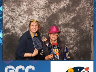 staff posing for photo booth
