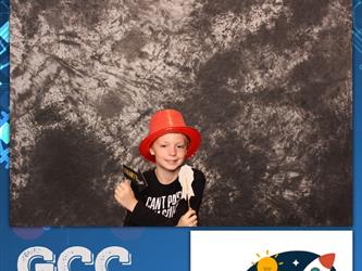 child posing for photo booth 