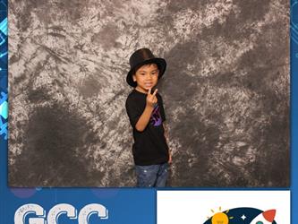 child posing for photo booth