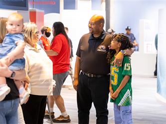 family learning about exhibit 