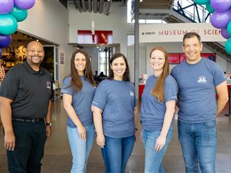 gcc staff posing together 