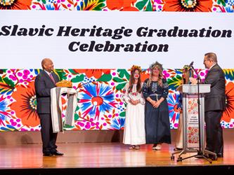 students walking on stage