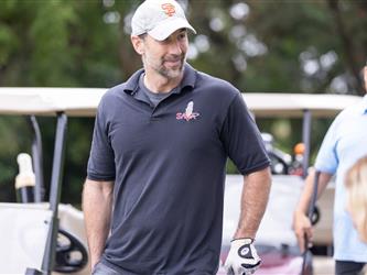 attendee at golf tournament