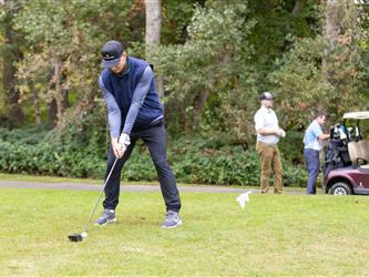 golf player preparing to swing