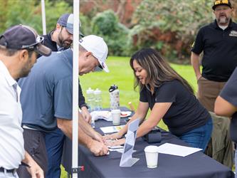 attendee at golf tournament
