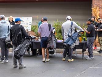 golf attendees entering