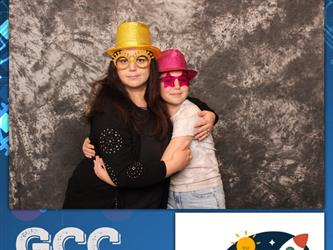 two people posing for photo booth