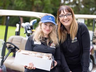 attendees at golf tournament