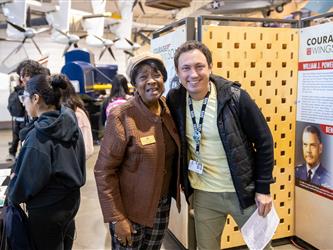 guests posing at entrance