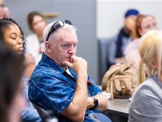gcc con attendees listening to speaker
