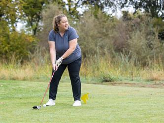 golf player preparing to swing