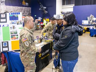 guests posing at entrance