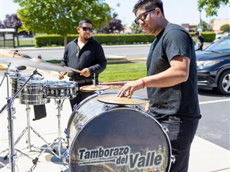band members playing instruments