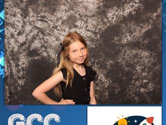 child posing for photo booth 