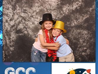 two kids hugging one another 