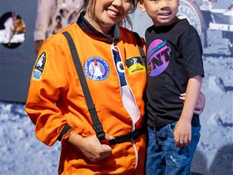 cccs principal in space suit posing