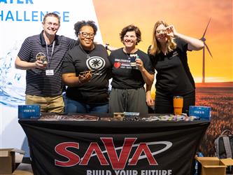 SAVA staff at booth