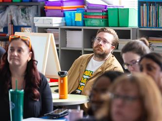 gcc con attendees listening to speaker