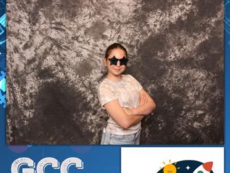 child posing for photo booth 