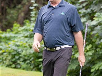 attendee at golf tournament