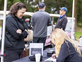 attendees at golf tournament
