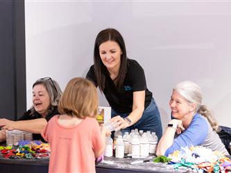 staff speaking with guests