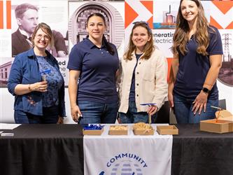 COA staff posed at table 
