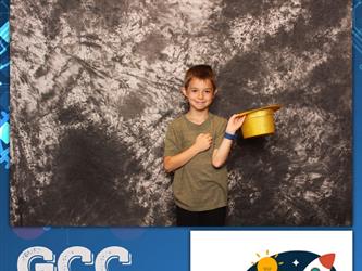 child posing for photo booth 
