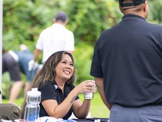 attendees at golf tournament
