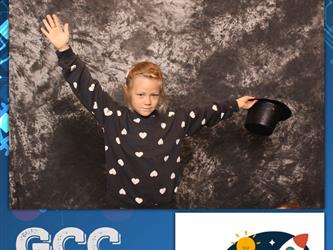 child posing for photo booth 