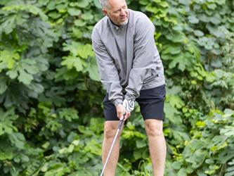 golf player preparing to swing