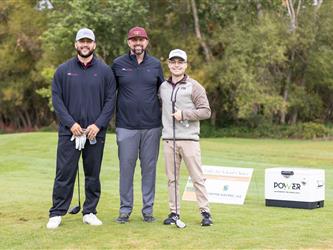 attendees at golf tournament