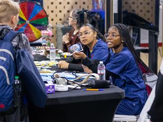 guests interacting at career fair