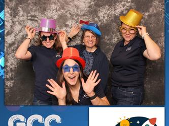 COA staff posing for photo booth
