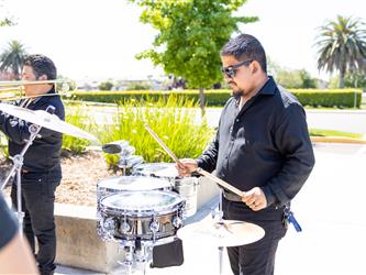 band members playing instruments