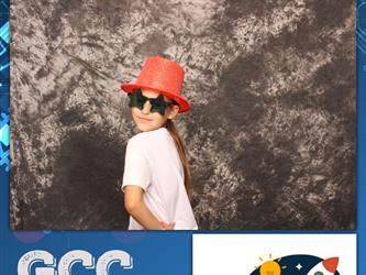 child posing for photo booth 