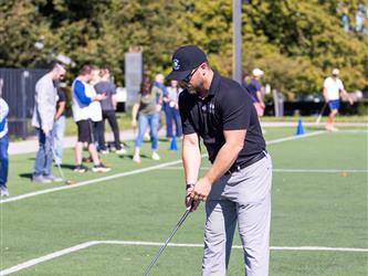 gcc employee in golf session