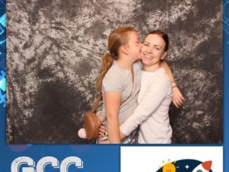 daughter kissing mom on cheek 