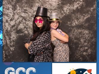 mother and child posing for photo booth 