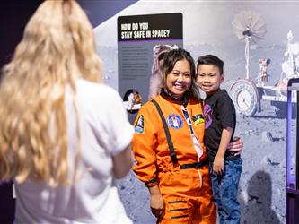cccs principal in space suit posing